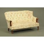 An Edwardian deep buttoned settee,