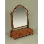 A George III mahogany toilet mirror,