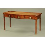 A Georgian mahogany serpentine fronted serving table,