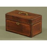 A George III mahogany tea caddy, with brass carrying handle,