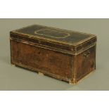A 19th century camphorwood leather upholstered and studded trunk.