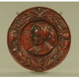 A cast iron plaque, Charles Martell, 19th century, diameter 41 cm.