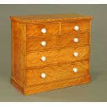 A Victorian satin walnut chest of drawers,