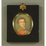 A portrait miniature on ivory The Duke of Wellington, oval in ebonised frame with acorn hanger,