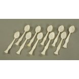 Ten Chinese mother of pearl spoons. Length 11 cm.