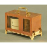An antique copper cased barograph, with a large quantity of Casella graphs.