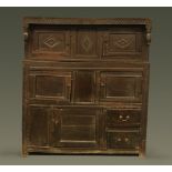 A 17th century oak court cupboard, dated 1662,