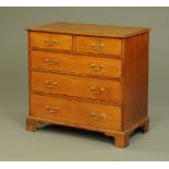A late 18th century oak chest of drawers,