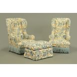 A pair of late Victorian wing easy chairs,