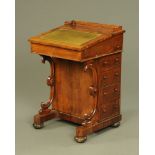 A Victorian rosewood Davenport desk, with rear gallery,