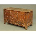 An antique oak coffer,