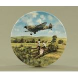 A Royal Doulton Spitfire coming home plate, limited edition. Diameter 20.5 cm.