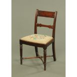 A Regency mahogany occasional chair, with bowed top rail,