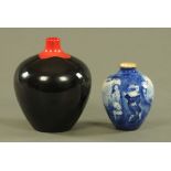 Two Royal Doulton vases, one Flambe impressed 1616, the other decorated in Flow Blue with children.