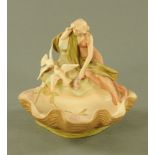 A Royal Dux clam shaped bowl with draped female figure and doves,