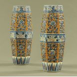 A pair of 19th century Chinese hexagonal leaf moulded vases. Height 35.5 cm (see illustration).