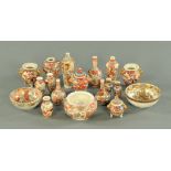 Eighteen pieces of Satsuma ware, three bowls and fifteen vases. Tallest height 18 cm.