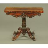 An early Victorian rosewood turnover top card table,