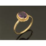 A 9 ct gold amethyst ring, Size L.