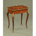 An early 20th century Continental parquetry and marquetry lift top dressing table with mirror to