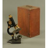 A Beck of London microscope, Number 782, cased.