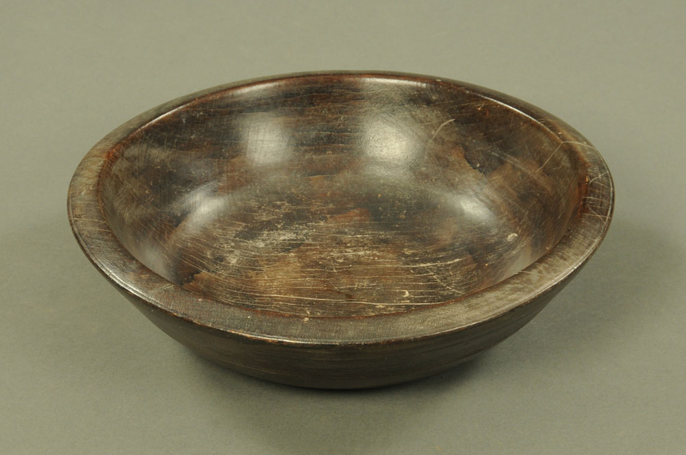 A 19th century turned wooden dairy bowl, diameter 35 cm.