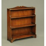 A mahogany open bookcase,