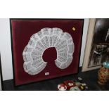 An antique framed lace collar