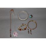 A quantity of costume jewellery including bangles,