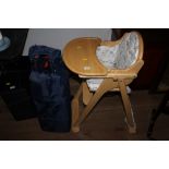 A mothercare wooden framed babies high chair,