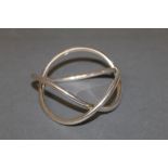 A George Jensen silver alliance bangle, designed by Alan Scharff, marked 925 and with Jensen stamp,