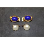 A pair of gilt metal and lapis lazuli style leaver back earrings together with a pair of gilt metal