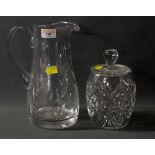 A heavy cut crystal jug, with wheel cut foliate decoration,