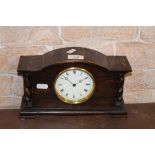 A 1920's oak mantle clock,