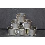 A set of 6 Edward VII silver napkin or serviette rings by Sydney & Co of plain design with cast