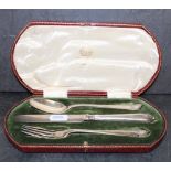 George V silver three piece christening set by Elkington with curved reeded terminals,