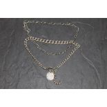 A silver graduated flat link watch chain converted to a bracelet and hung with a 1914 sixpence,