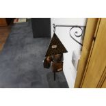 A copper and steel three division wind chime with bracket