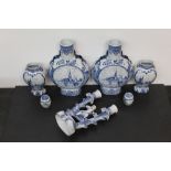 A pair of late 19th century delft blue and white pottery moon flasks,