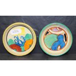 A Clarice Cliff bizarre pottery "Gay Day" pattern circular pin dish and one other Clarice Cliff