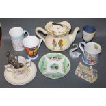 A Royal Doulton series ware teapot, a Royal Doulton miniature Nelson character jug,