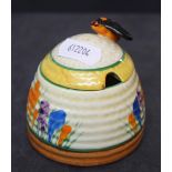 A Clarice Cliff bizarre pottery "Spring Crocus" pattern honey jar and cover 7.