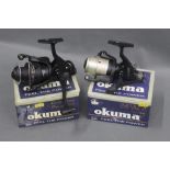 Two Okuma fixed spool reels, an Impala and a Dyna Drag Pro Dap 50.