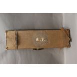 A canvas and leather trimmed shotgun motor case,