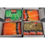 Four boxes of Octopus bait sea fishing jigs.