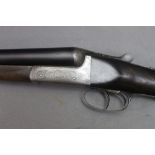 A J Russell a 12 bore side by side shotgun, with 29 1/2" barrels, quarter and three quarter choke,