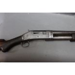 A Winchester model 1897, 16 bore pump action shotgun, with a 26 1/2" barrel, full choke,