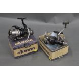 Two Okuma EPR 50 fixed spool reels.