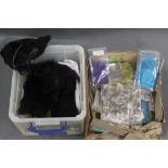 Two boxes of black bear fur, guinea fowl feathers, Mongolian goat hair etc.