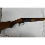 A Russian 12 bore single barreled shotgun, with 29" barrel, three quarter choke, 2 3/4" chamber,